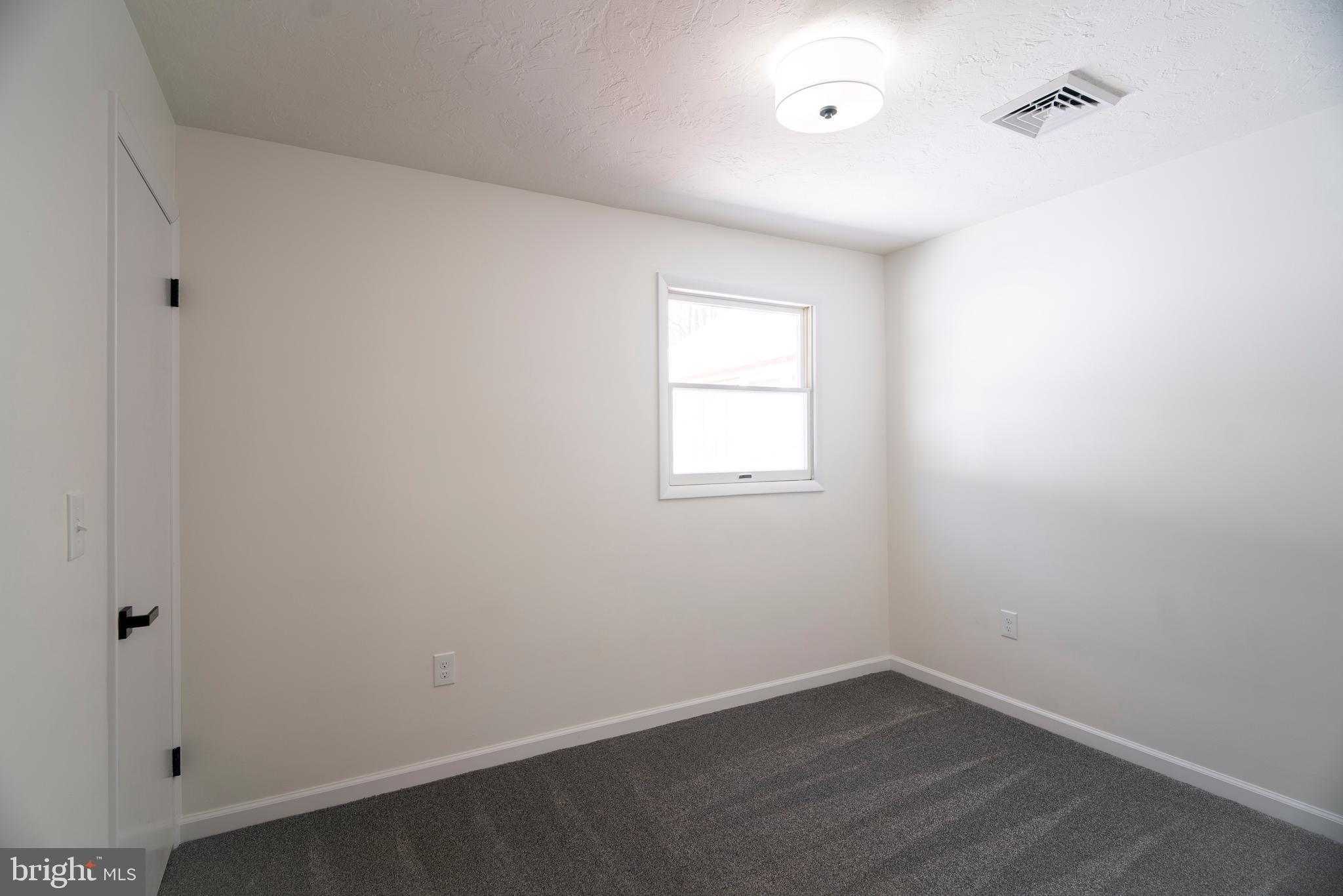 6152 Pigeon Hill Road Spring Grove, PA 17362 - Photo 12 of 35 an empty room with a window