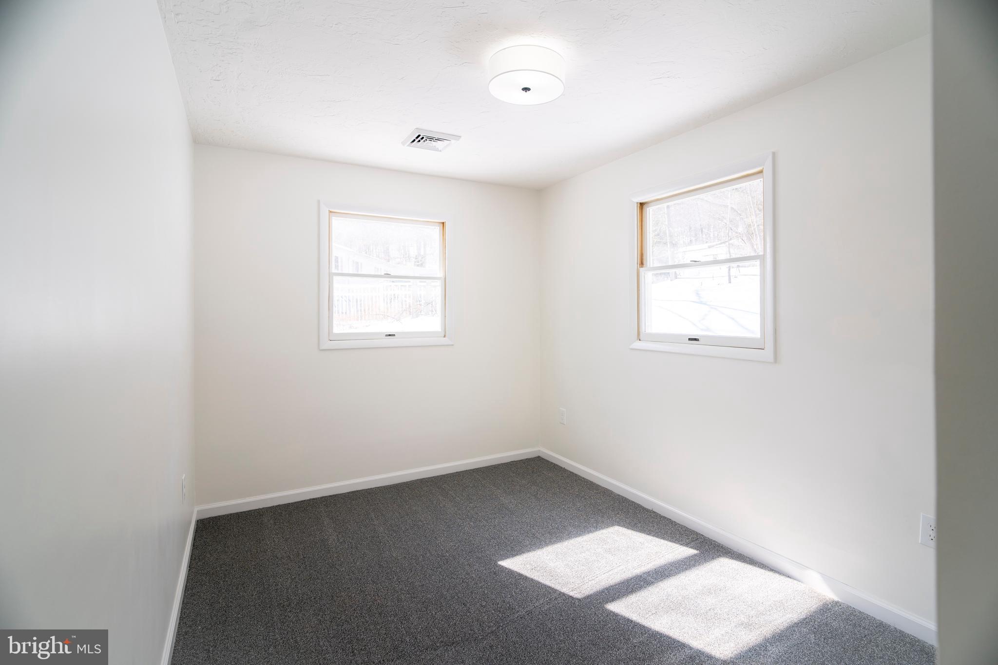 6152 Pigeon Hill Road Spring Grove, PA 17362 - Photo 14 of 35 an empty room with windows