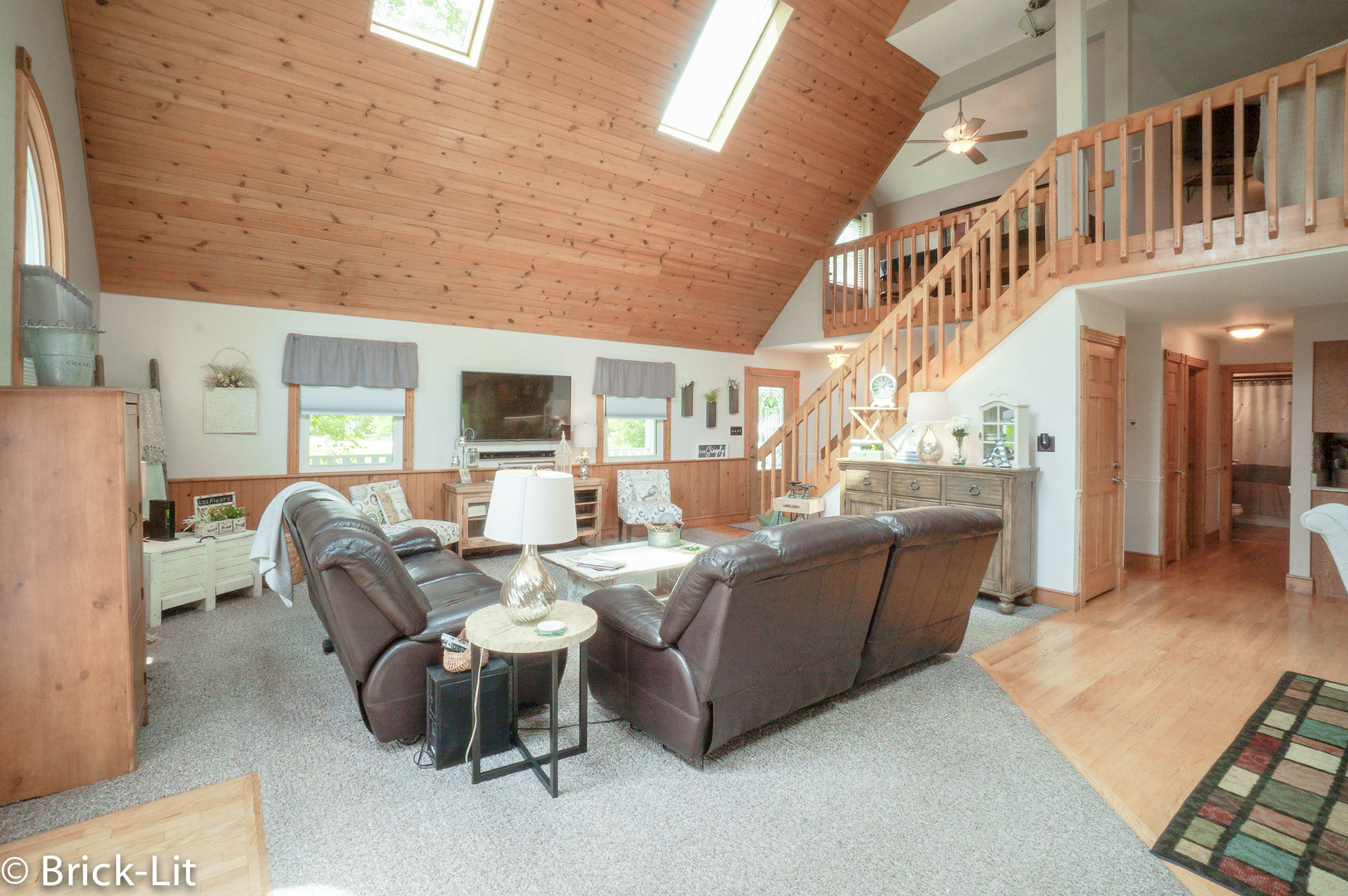 23959 South Schoolhouse Road Manhattan, IL 60442 - Photo 12 of 31 a living room with furniture wooden floor and a large window