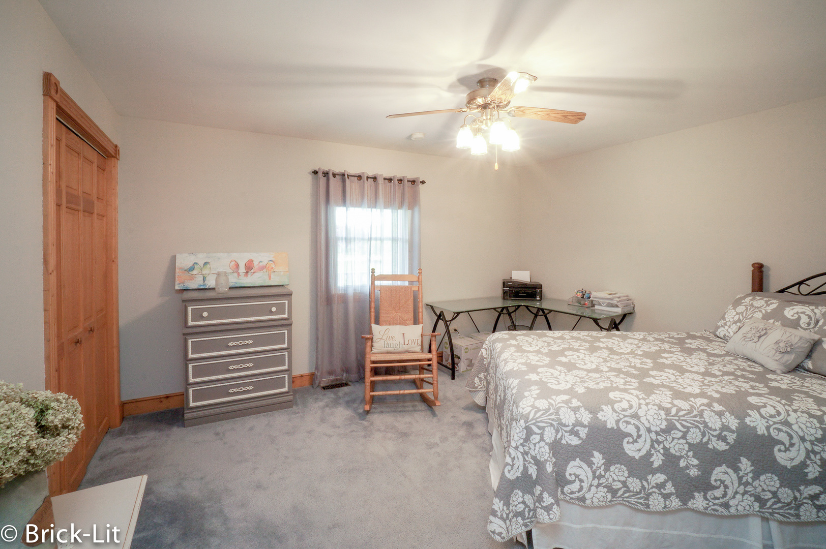 23959 South Schoolhouse Road Manhattan, IL 60442 - Photo 18 of 31 a bedroom with a bed and a chandelier
