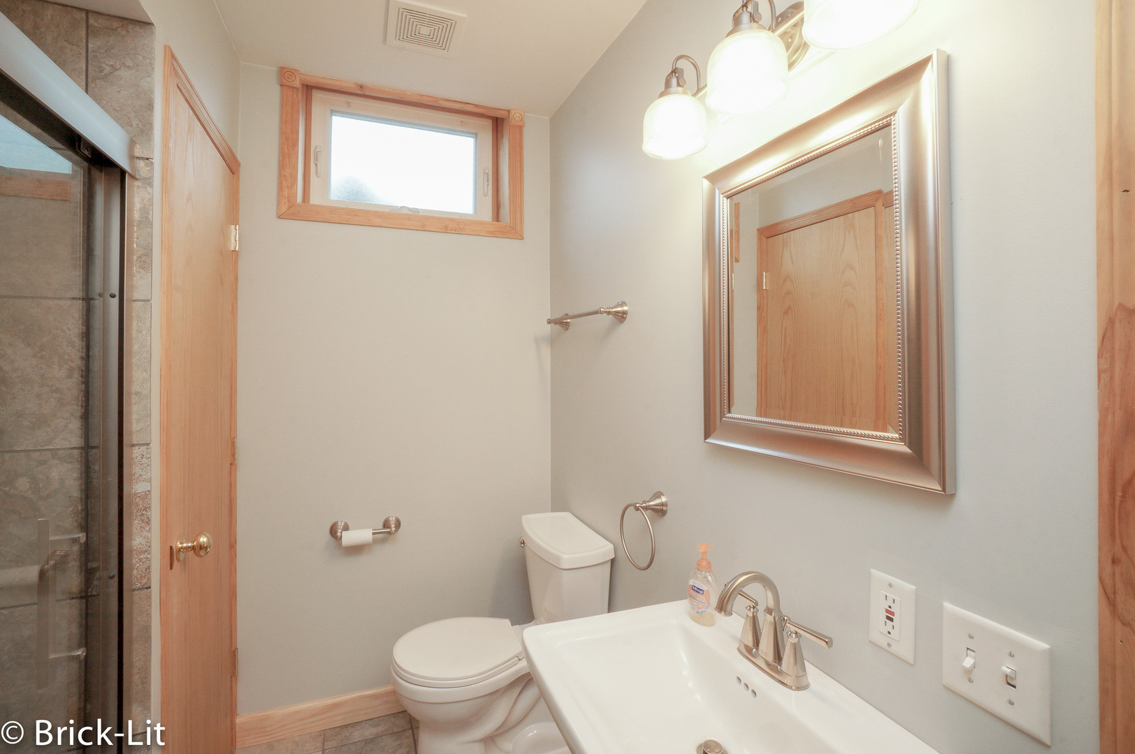 23959 South Schoolhouse Road Manhattan, IL 60442 - Photo 31 of 31 a bathroom with a sink a toilet and shower