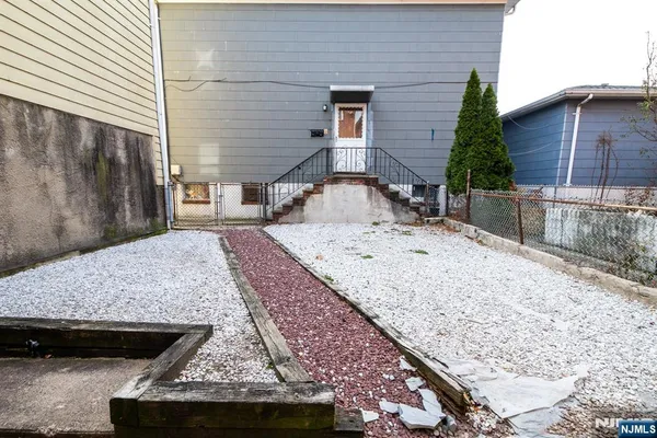 a view of a backyard with a patio