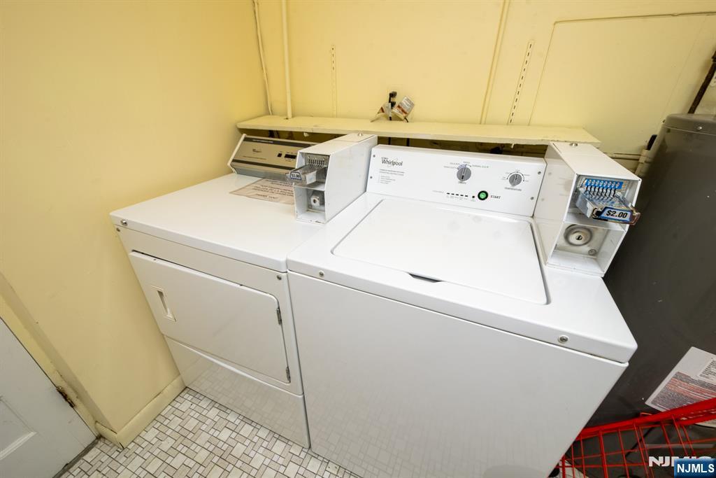 412 Walker Street, Unit 1 Fairview, NJ 07022 - Photo 10 of 10 a utility room with dryer and washer