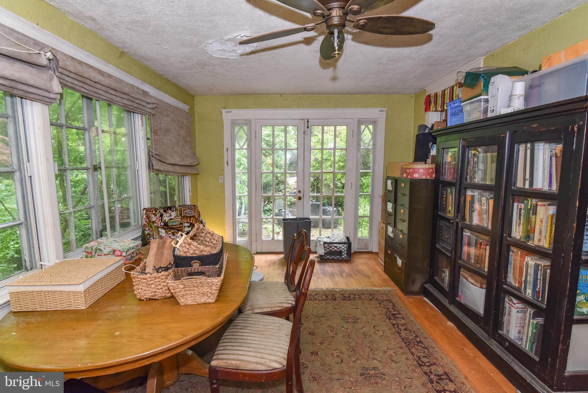 24 Merrymount Road Baltimore, MD 21210 - Photo 12 of 48 a dining room with furniture water view and a large window