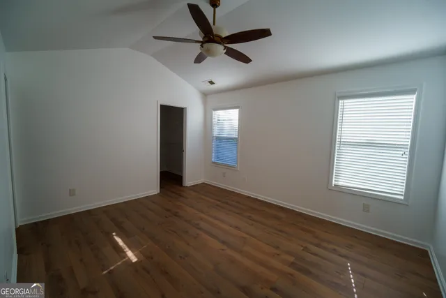 a view of a room with racks on the wall