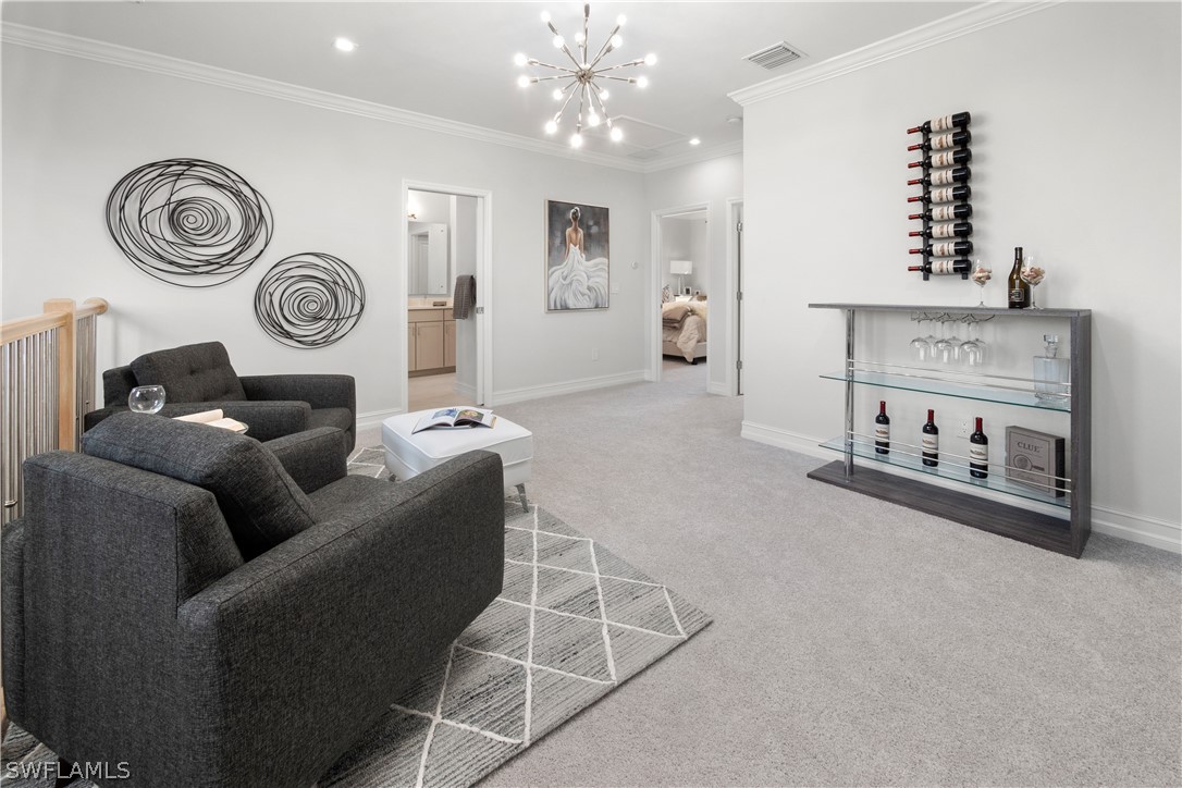7587 Morgan Way Naples, FL 34119 - Photo 16 of 29 a living room with furniture and a clock