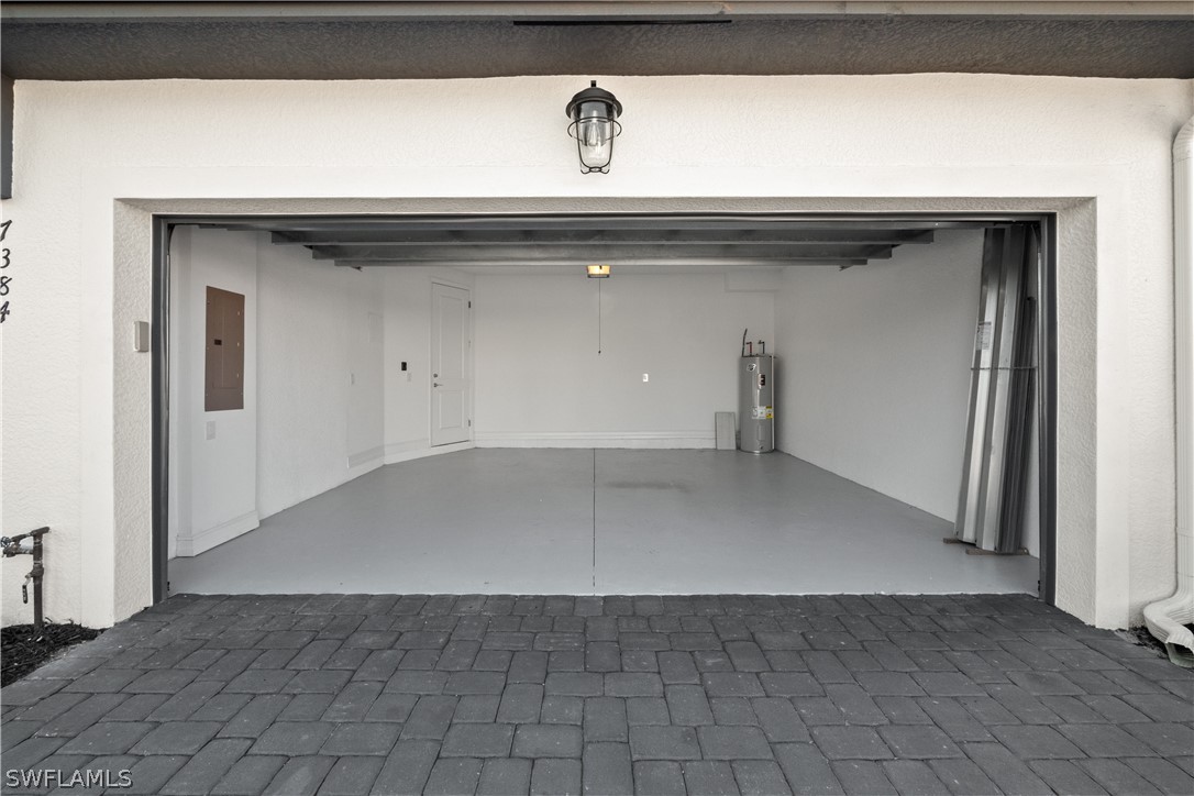 7587 Morgan Way Naples, FL 34119 - Photo 2 of 29 a view of a garage