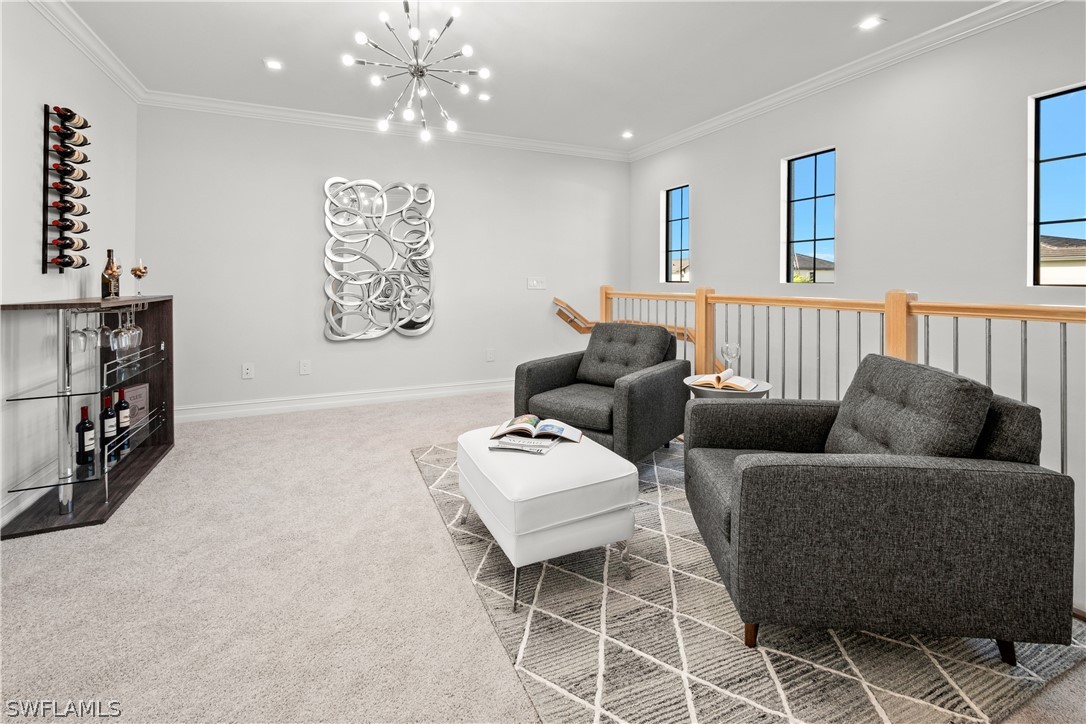 7587 Morgan Way Naples, FL 34119 - Photo 21 of 29 a living room with furniture and a flat screen tv