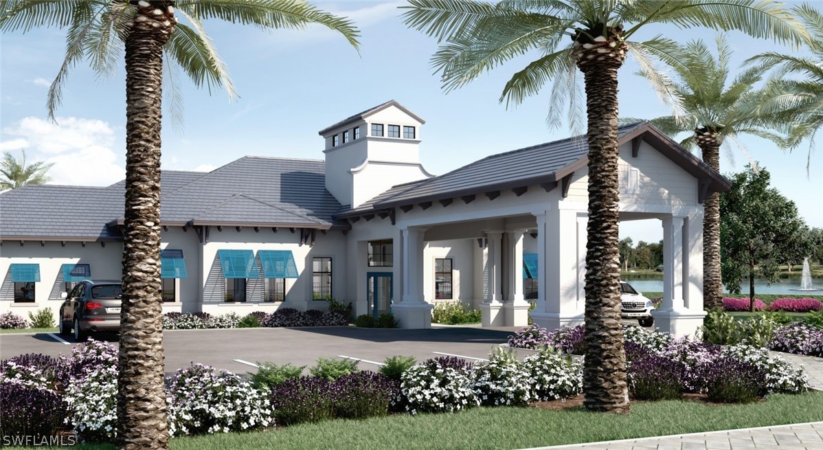 7587 Morgan Way Naples, FL 34119 - Photo 23 of 29 front view of a house with a yard