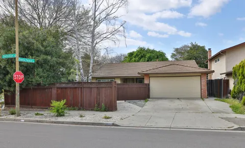 a house view with a garden space