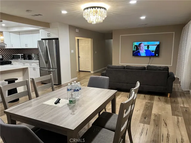 a view of a dining room with furniture