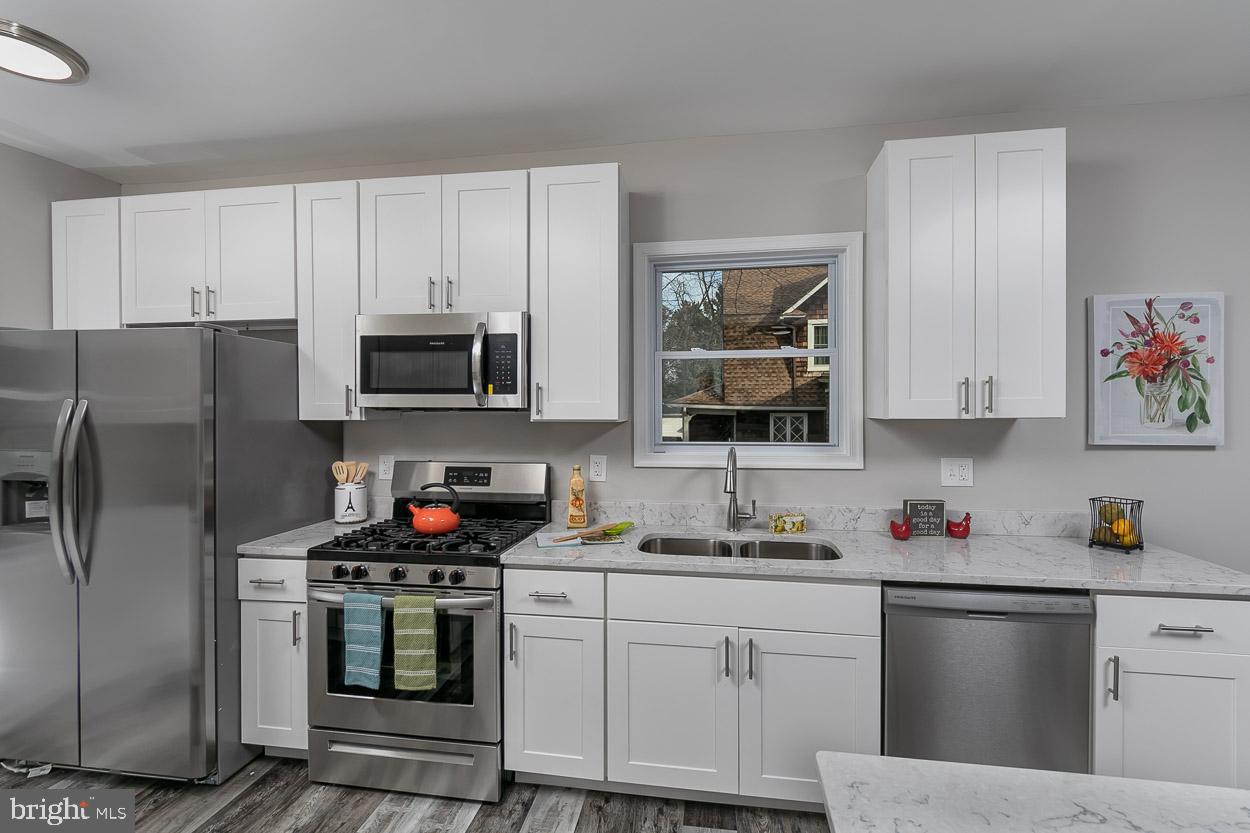 210 West Maple Road Linthicum Heights, MD 21090 - Photo 16 of 46 All New Stainless Steel Appliances.