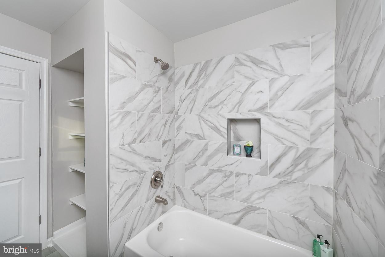 210 West Maple Road Linthicum Heights, MD 21090 - Photo 28 of 46 Beautiful Custom Tile in Main Bath.