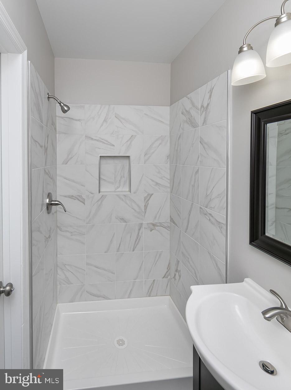 210 West Maple Road Linthicum Heights, MD 21090 - Photo 36 of 46 Master Shower with custom tile