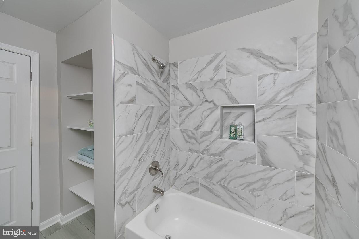 210 West Maple Road Linthicum Heights, MD 21090 - Photo 43 of 46 Gorgeous Tile Work in Upper Full Bath.