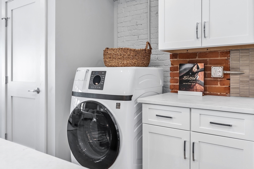 200 Merrimack Street, Unit 202 Haverhill, MA 01830 - Photo 10 of 13 a utility room with dryer and washer