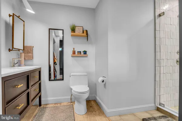 a bedroom with a bed and a cabinets