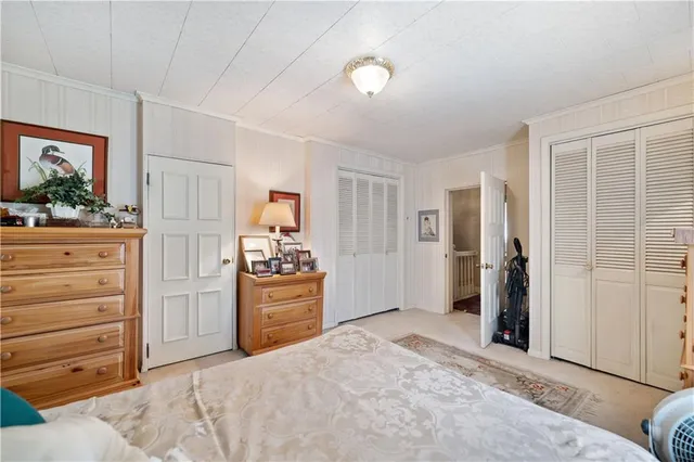 a kitchen with a refrigerator and a stove top oven