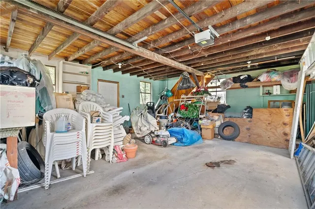 a view of a house with a yard and plants