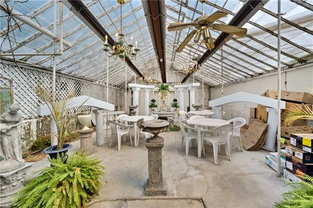 a bedroom with furniture and a bathroom