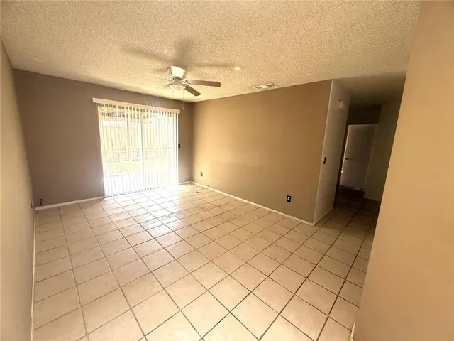 a kitchen with a stove a sink and a refrigerator
