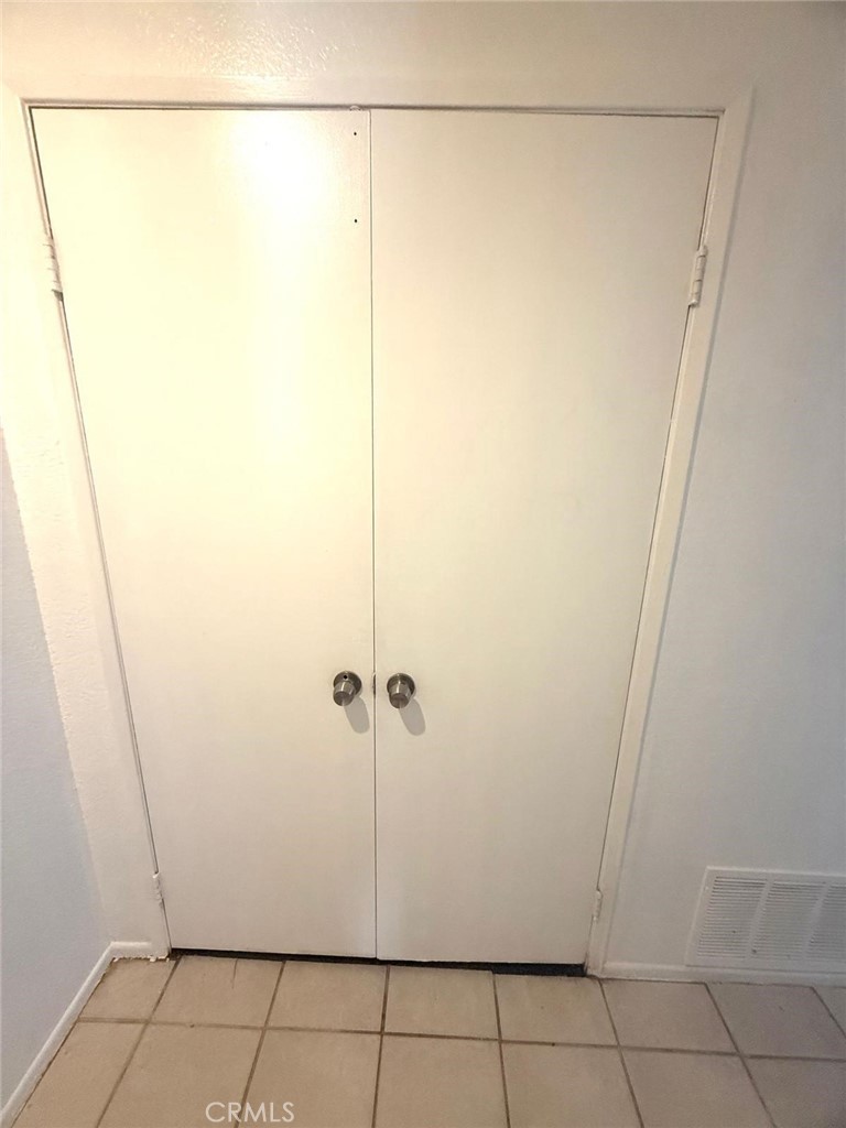 495 West 13th Street Perris, CA 92570 - Photo 15 of 32 a bathroom with a shower