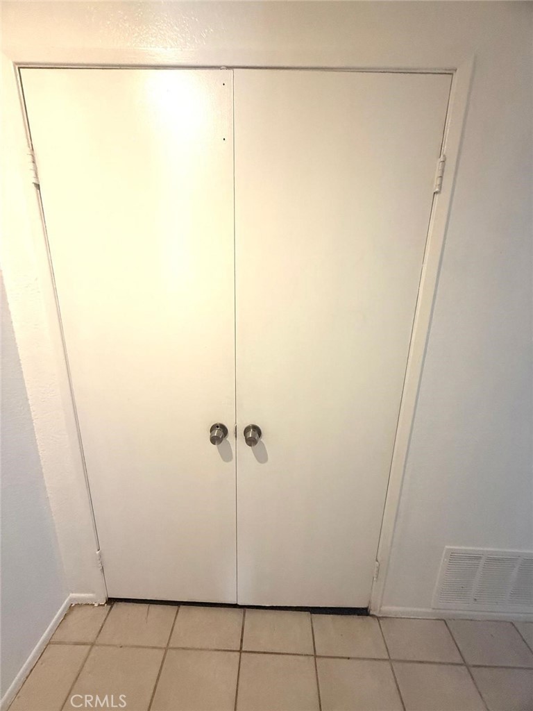 495 West 13th Street Perris, CA 92570 - Photo 22 of 32 a bathroom with a shower