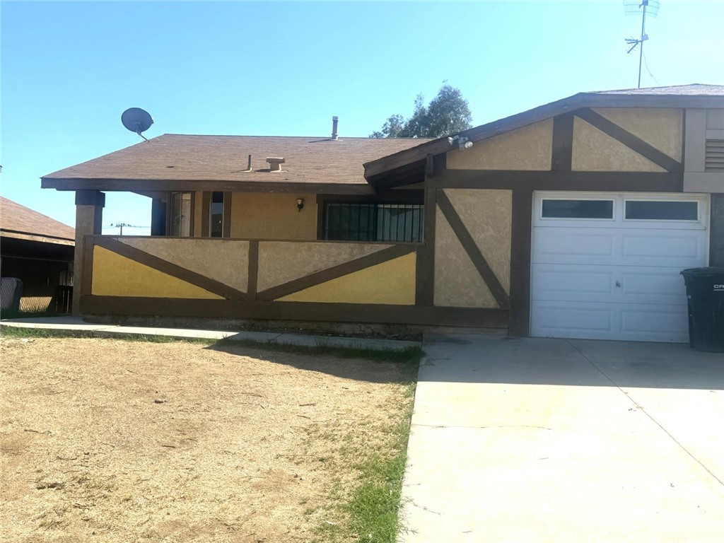 495 West 13th Street Perris, CA 92570 - Photo 32 of 32 a view of a house with a yard