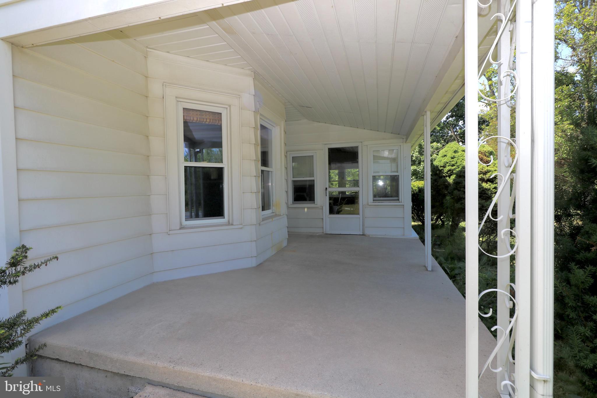 257 Valley Road Birdsboro, PA 19508 - Photo 19 of 21 FRONT PORCH COVERED ALSO FLORIDA SUNROOM