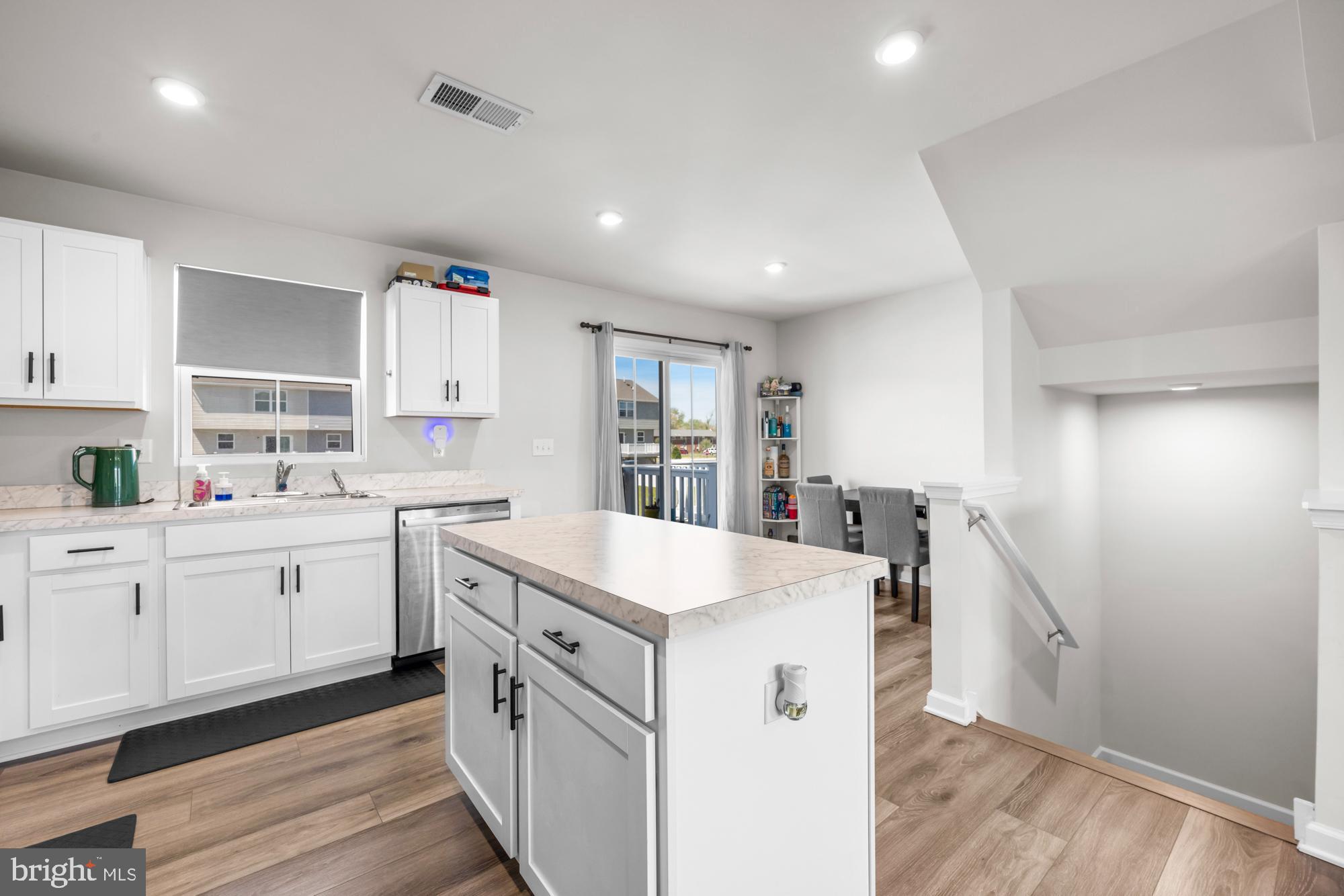 11 Mulberry Lane Clementon, NJ 08021 - Photo 13 of 32 a kitchen that has a sink and a stove in it
