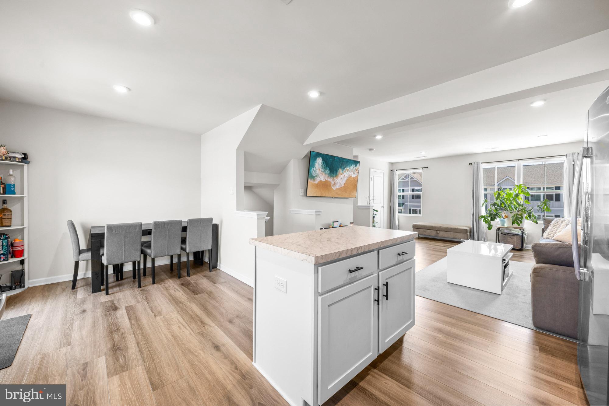 11 Mulberry Lane Clementon, NJ 08021 - Photo 14 of 32 a open kitchen with stainless steel appliances granite countertop a lot of counter space and wooden floor