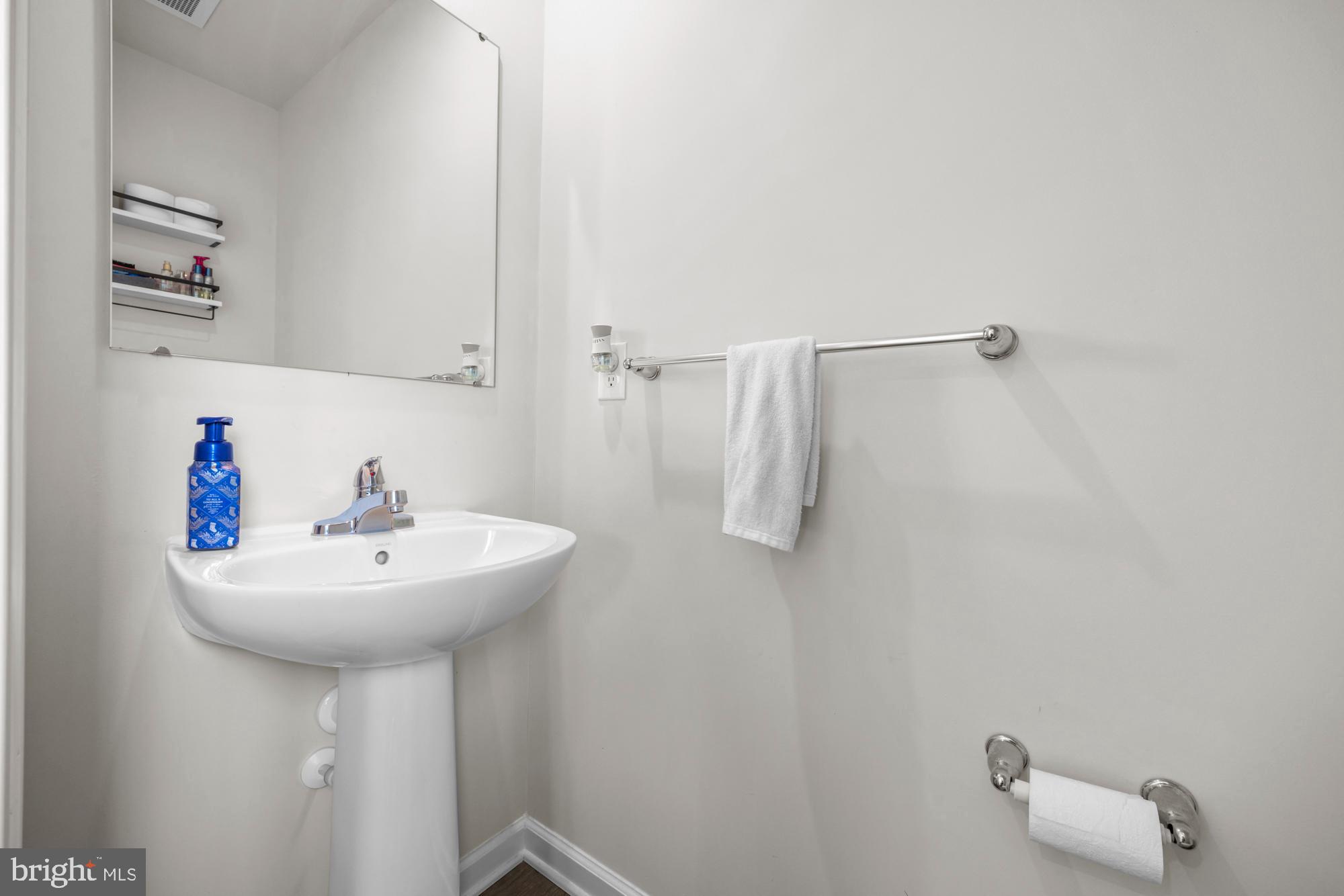 11 Mulberry Lane Clementon, NJ 08021 - Photo 17 of 32 a bathroom with a sink a mirror and shower