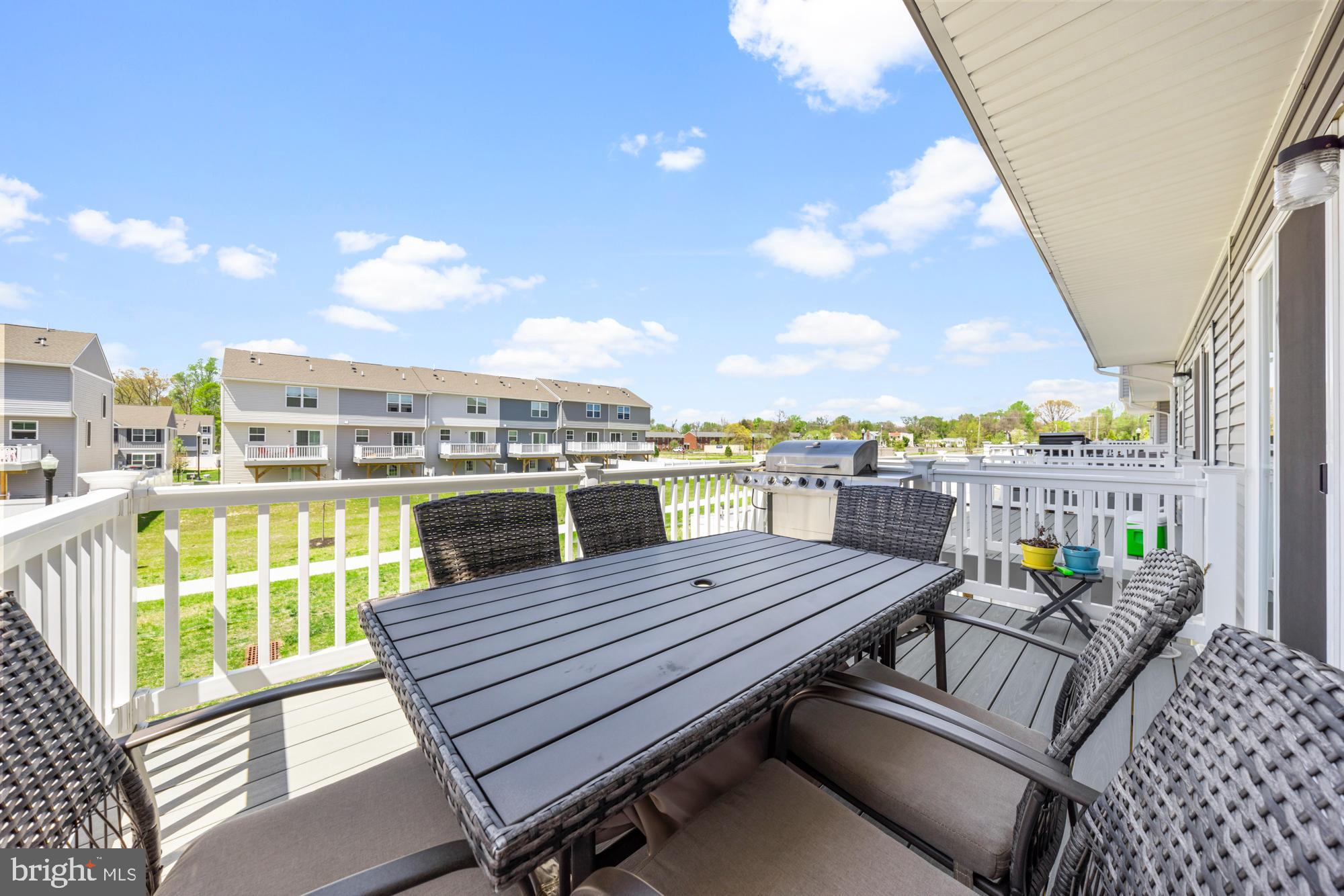 11 Mulberry Lane Clementon, NJ 08021 - Photo 19 of 32 a view of a balcony with wooden benches