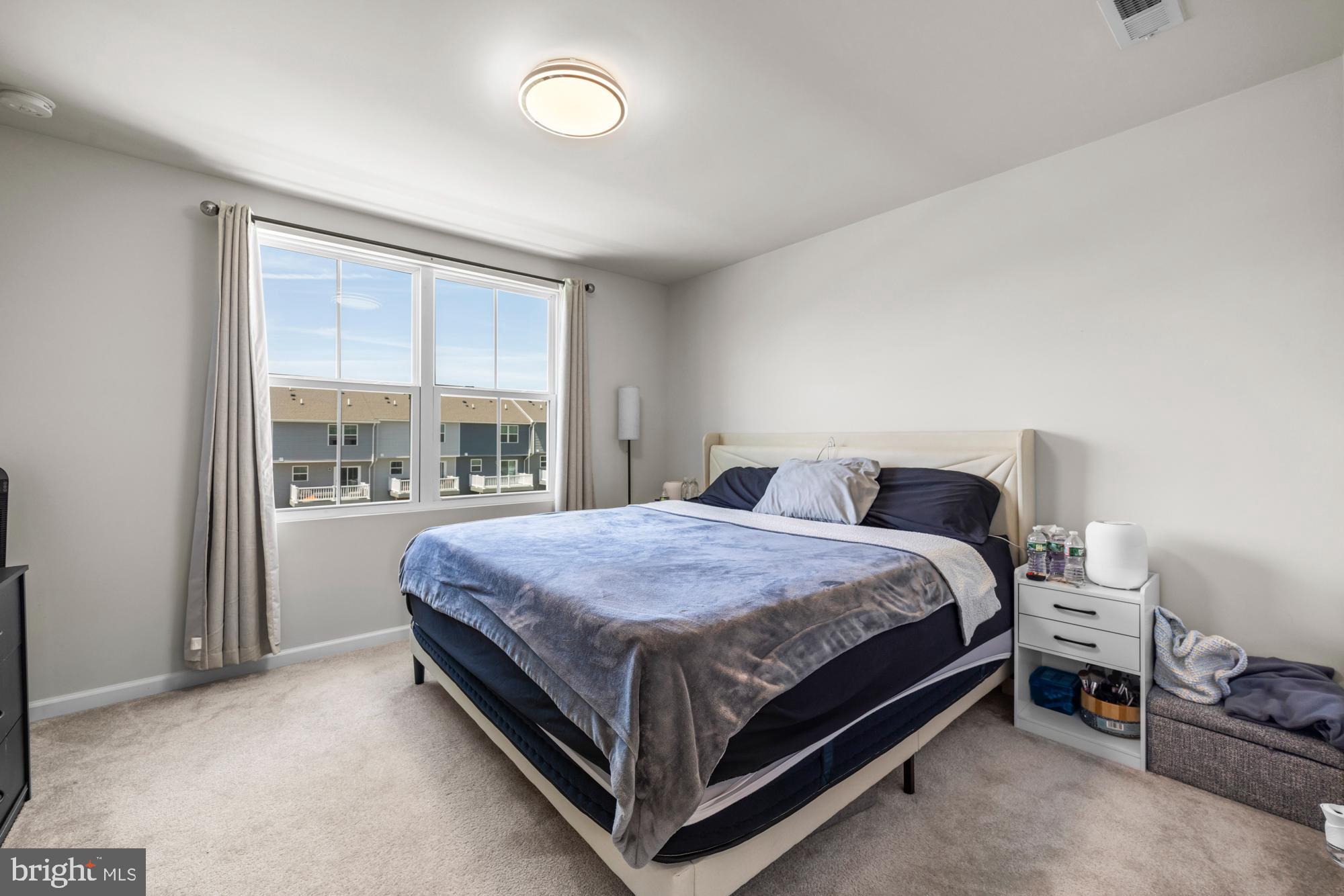 11 Mulberry Lane Clementon, NJ 08021 - Photo 20 of 32 a bed sitting in a bedroom next to a window