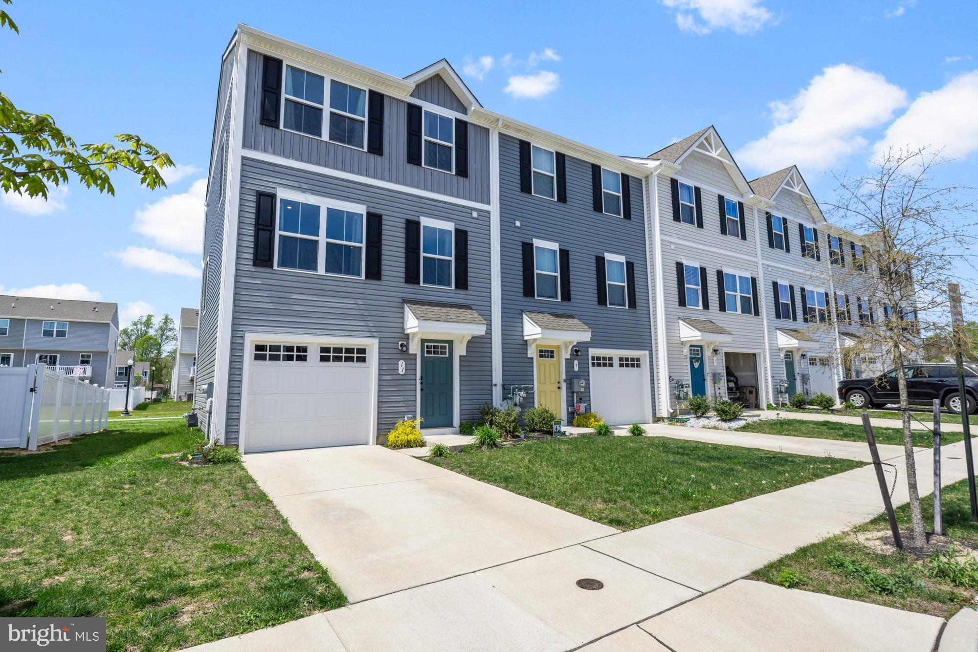 11 Mulberry Lane Clementon, NJ 08021 - Photo 2 of 32 a front view of a building with a yard