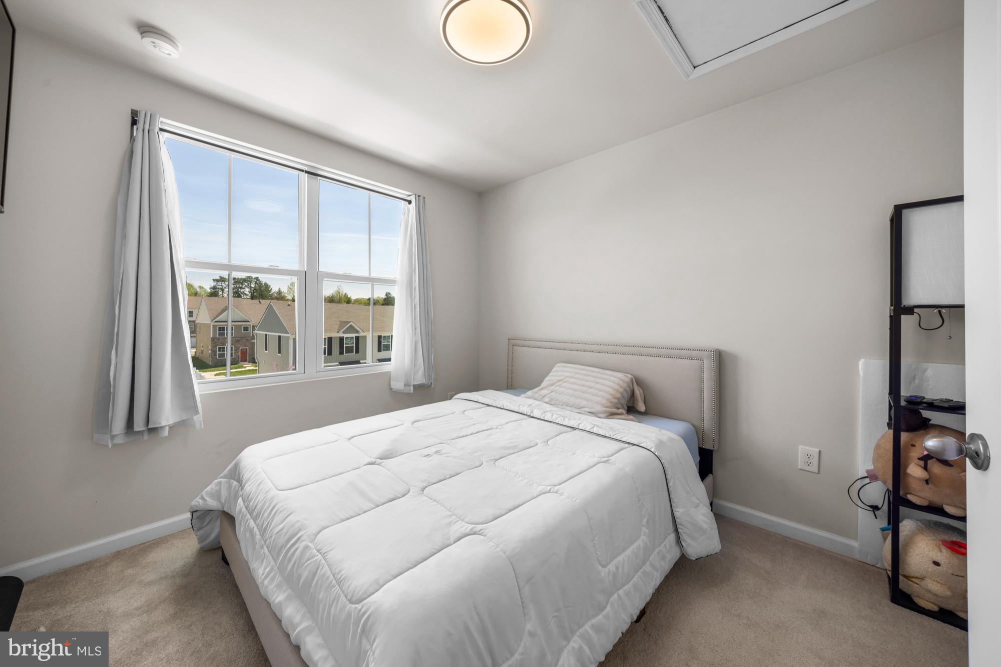 11 Mulberry Lane Clementon, NJ 08021 - Photo 24 of 32 a bedroom with a bed and a window