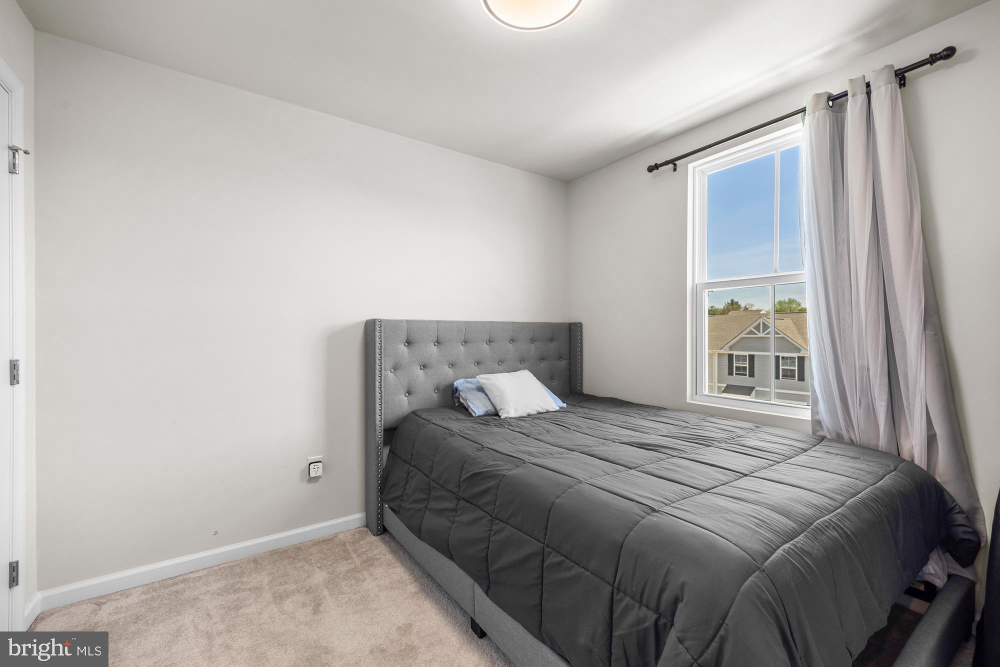 11 Mulberry Lane Clementon, NJ 08021 - Photo 25 of 32 a bedroom with a bed and a window