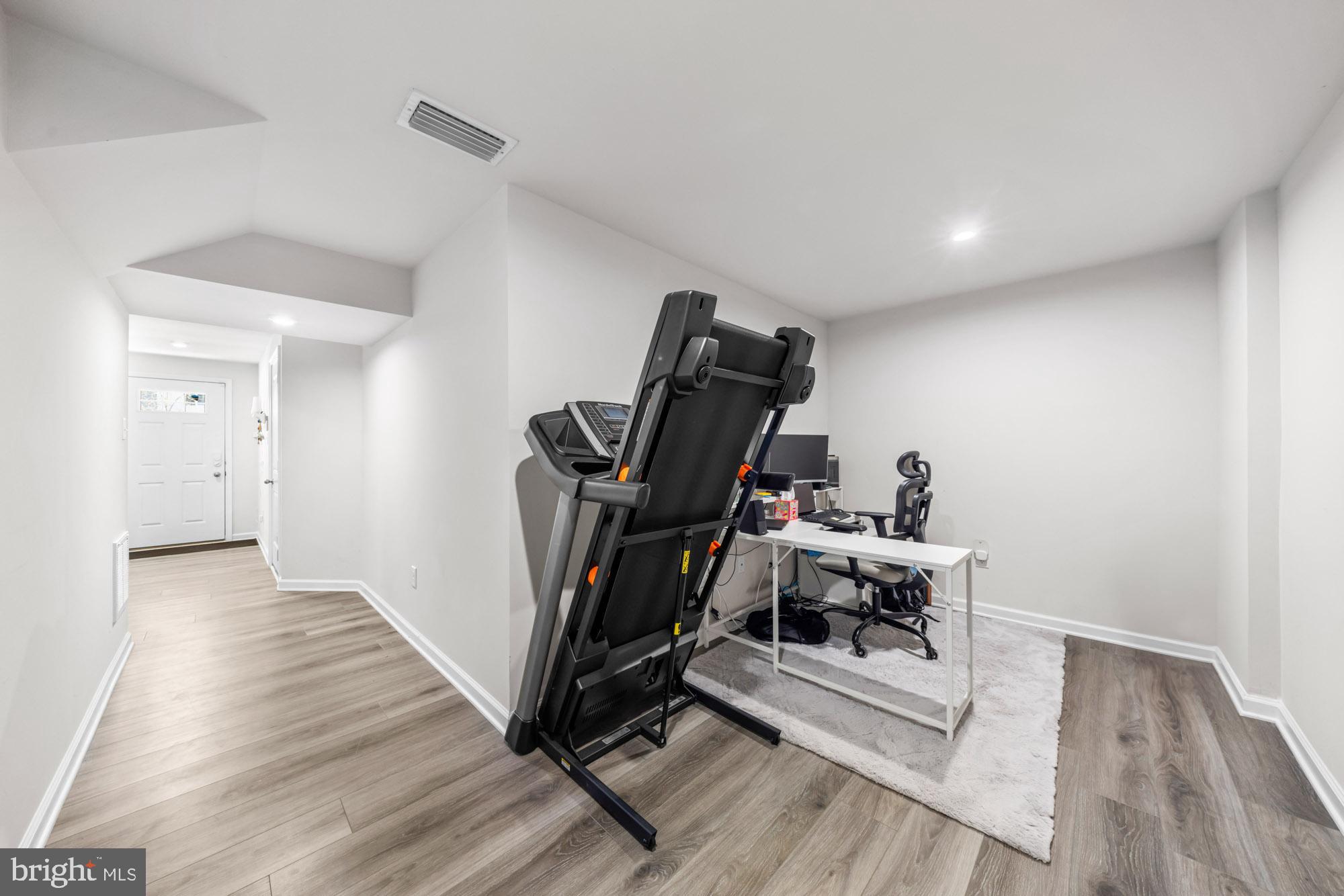 11 Mulberry Lane Clementon, NJ 08021 - Photo 5 of 32 a view of a room with gym equipment
