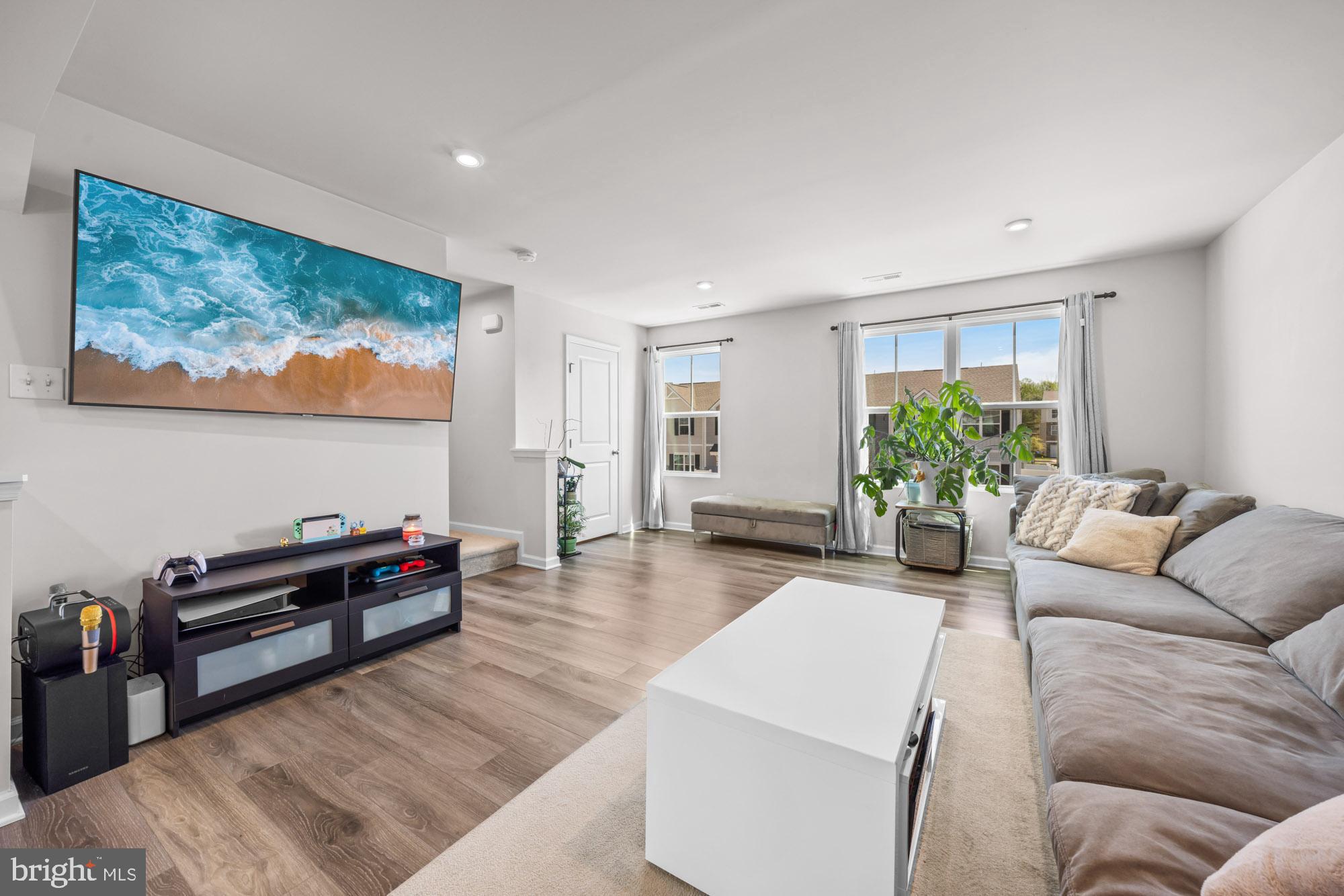 11 Mulberry Lane Clementon, NJ 08021 - Photo 8 of 32 a living room with furniture and a potted plant