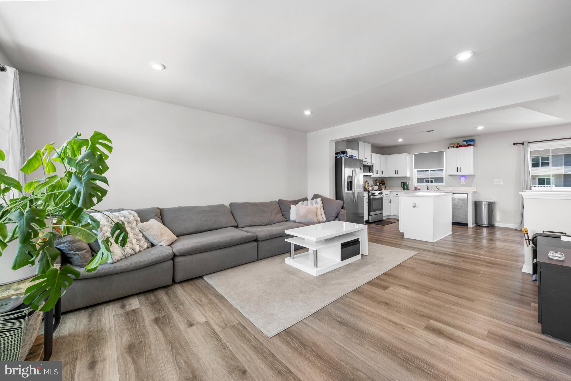11 Mulberry Lane Clementon, NJ 08021 - Photo 9 of 32 a living room with furniture and a wooden floor