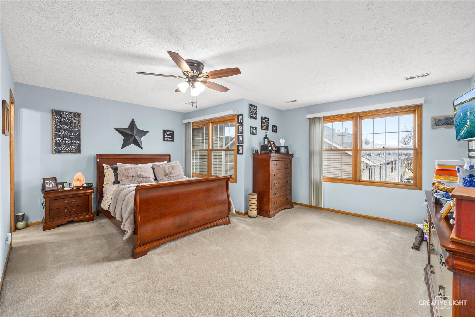 470 South Peace Road Sycamore, IL 60178 - Photo 17 of 25 a spacious bedroom with a bed and a window