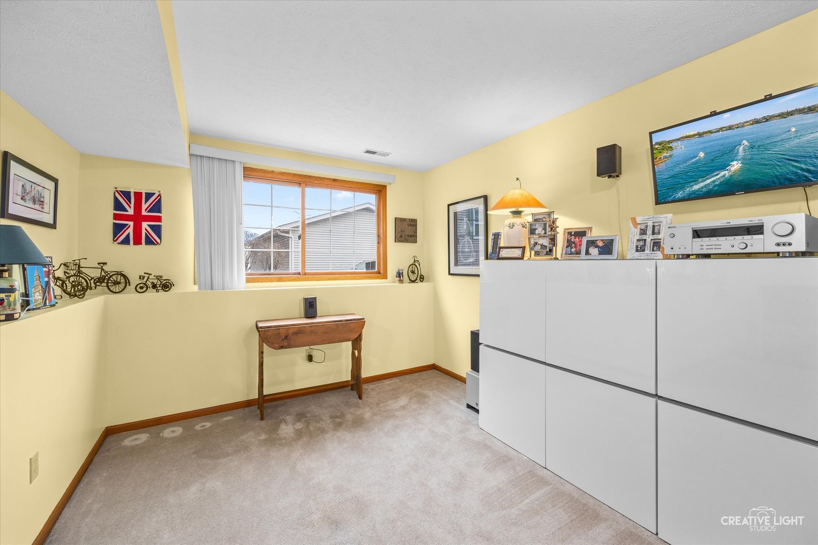 470 South Peace Road Sycamore, IL 60178 - Photo 22 of 25 a living room with furniture and a refrigerator