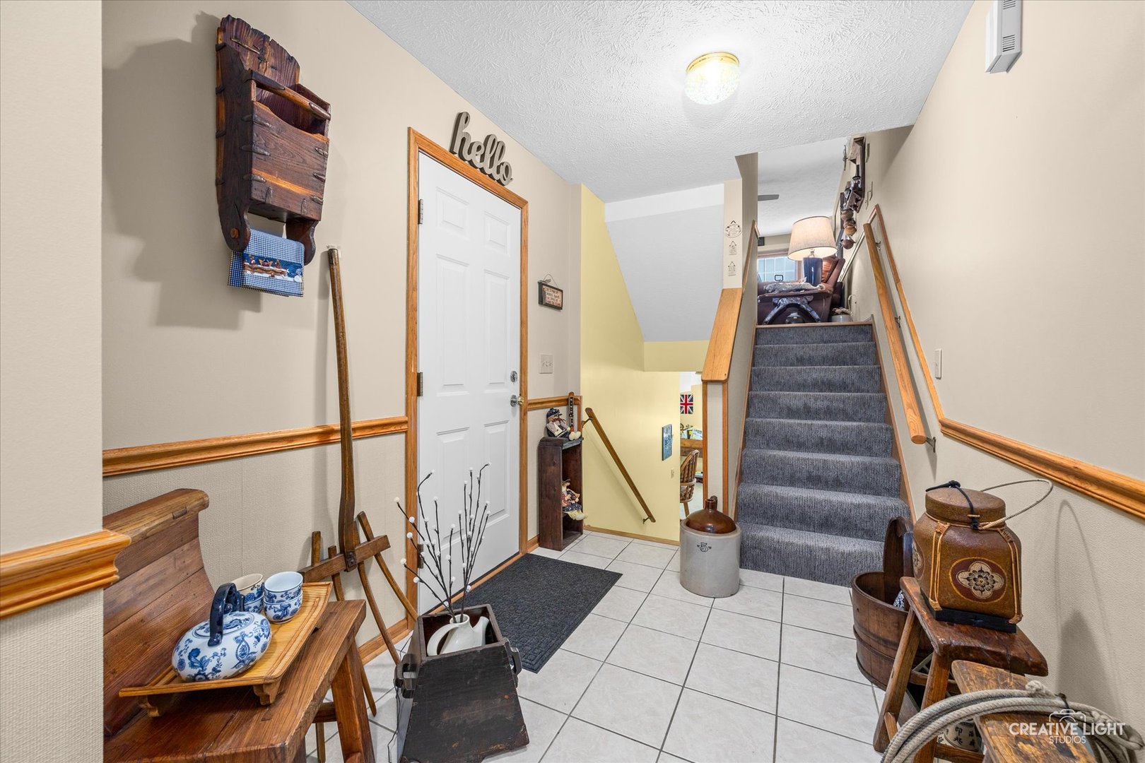 470 South Peace Road Sycamore, IL 60178 - Photo 5 of 25 a view of a livingroom with furniture and stairs