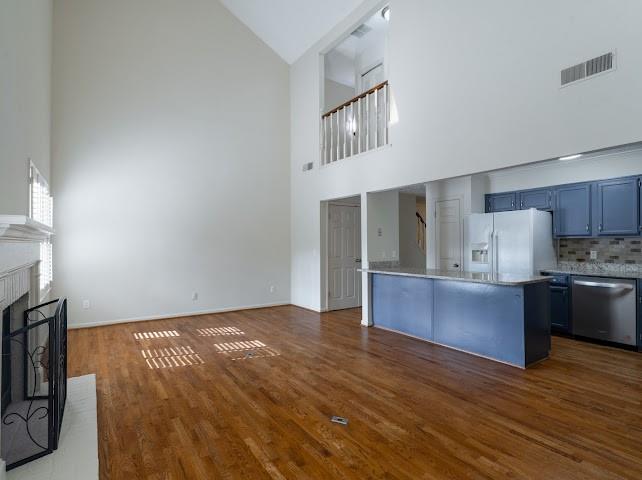 1307 Whitlock Ridge Drive Marietta, GA 30064 - Photo 8 of 29 a kitchen with stainless steel appliances granite countertop a stove a sink and a refrigerator