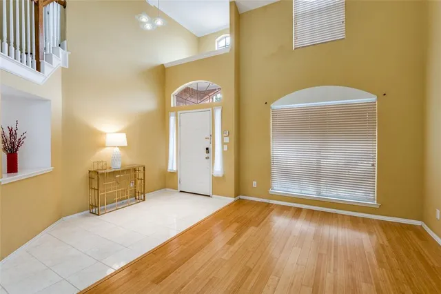 a view of a livingroom with wooden floor