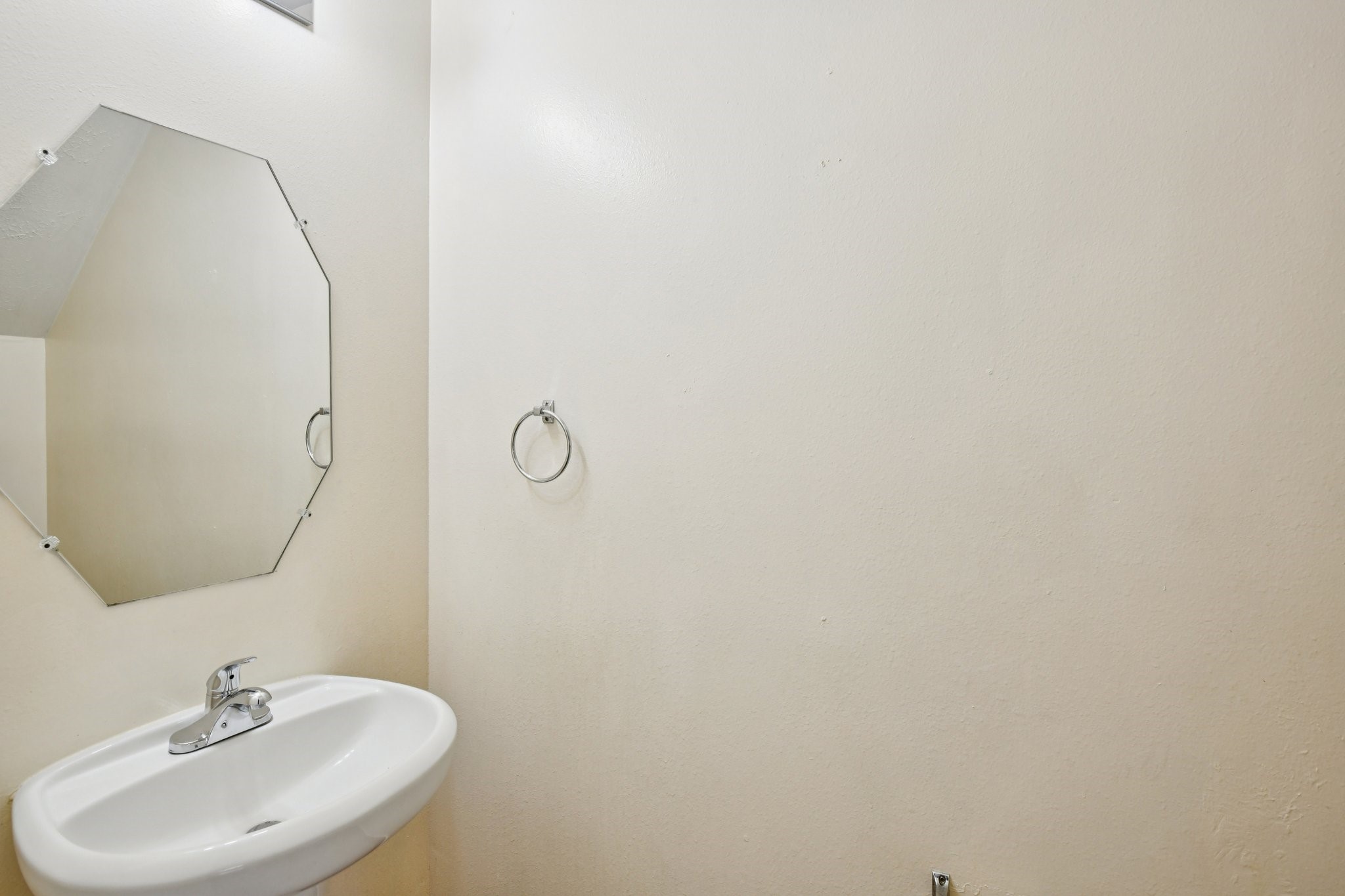 12270 Cobbs Creek Road Houston, TX 77067 - Photo 19 of 42 a bathroom with a sink and mirror