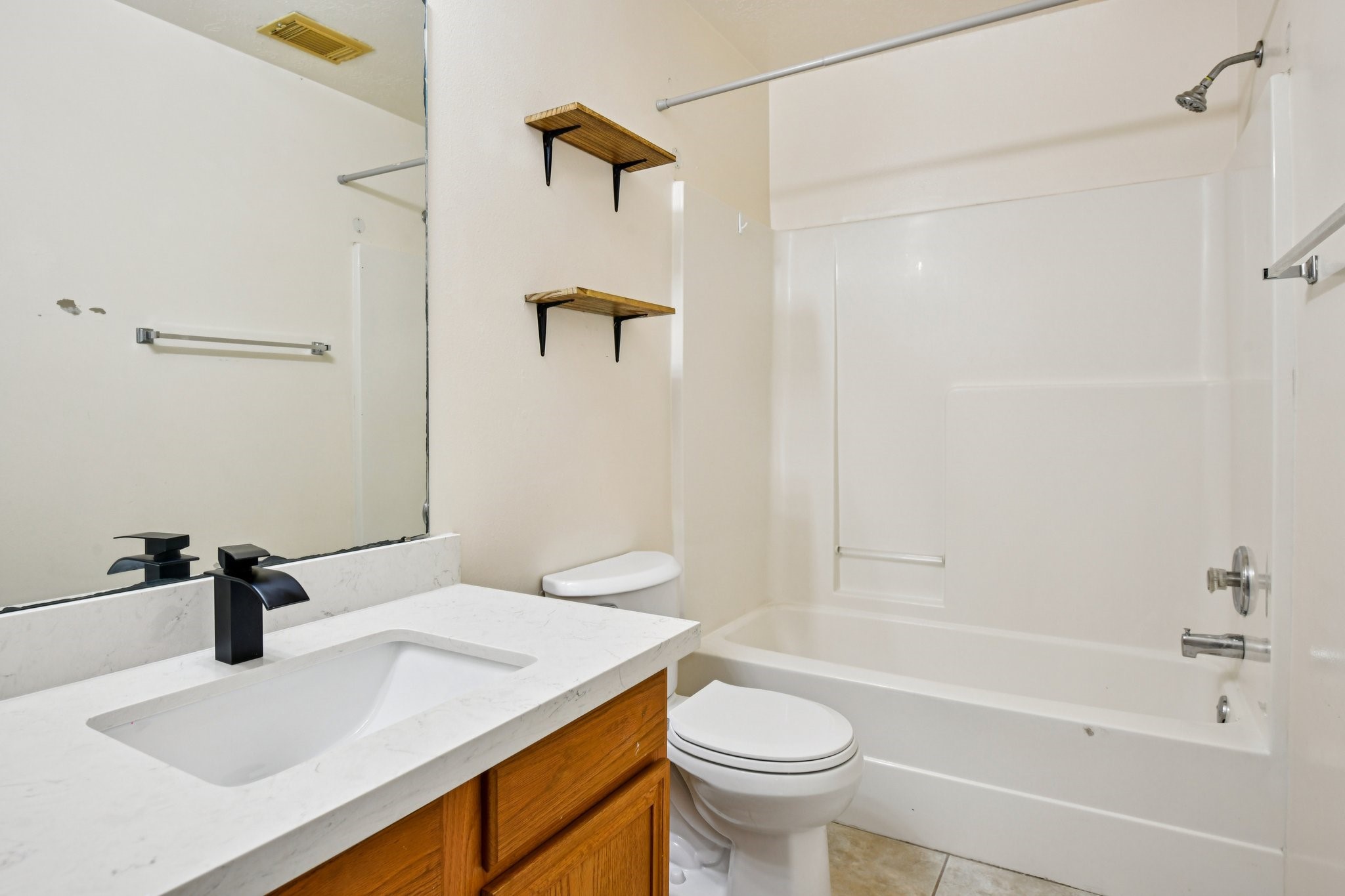 12270 Cobbs Creek Road Houston, TX 77067 - Photo 24 of 42 a bathroom with a sink a toilet and shower