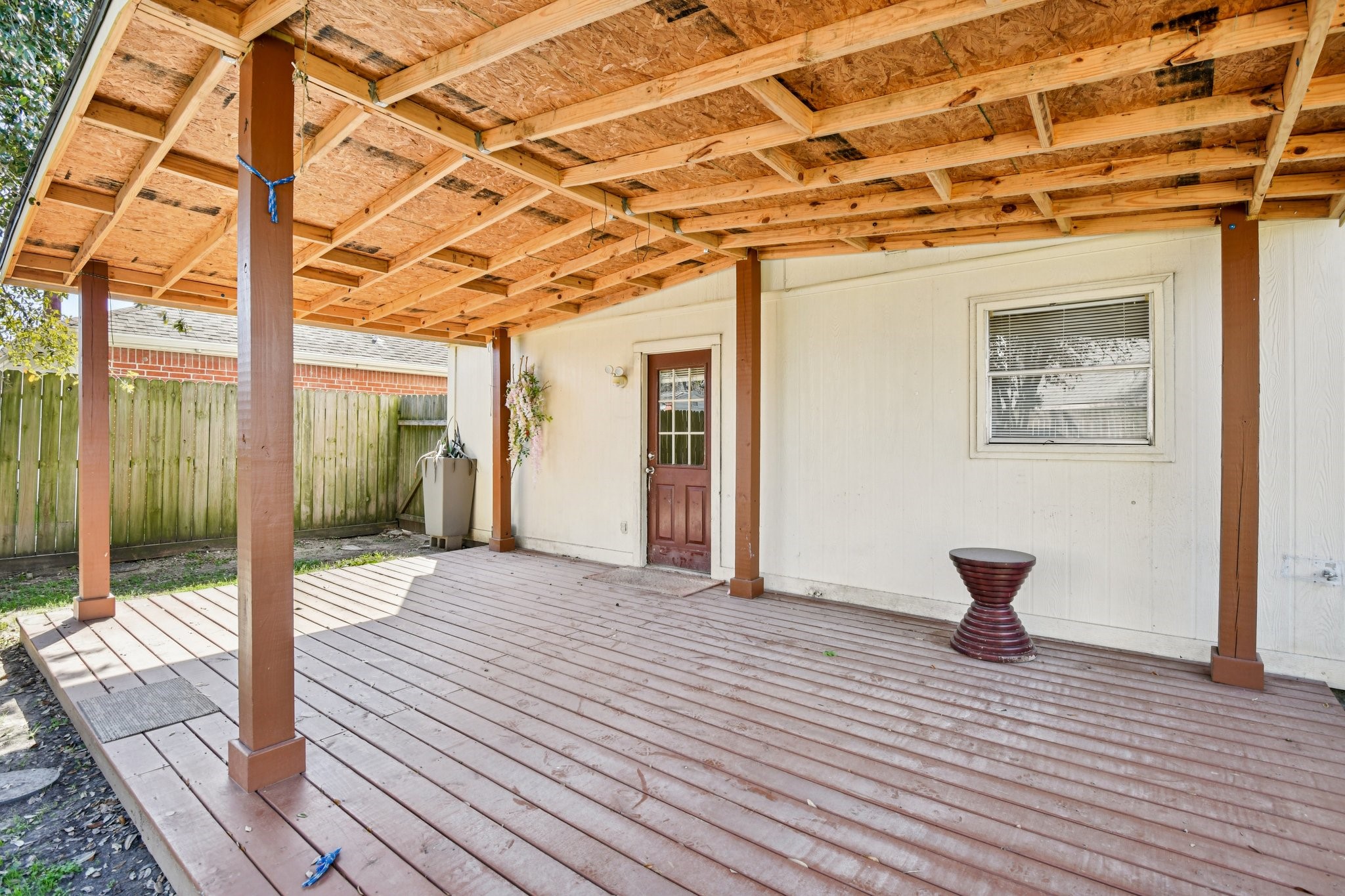 12270 Cobbs Creek Road Houston, TX 77067 - Photo 39 of 42 a view of a hallway with wooden floor and chair
