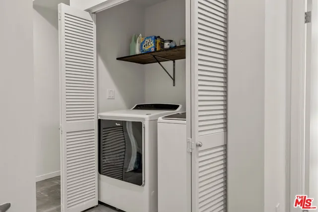 a view of a hallway and closet