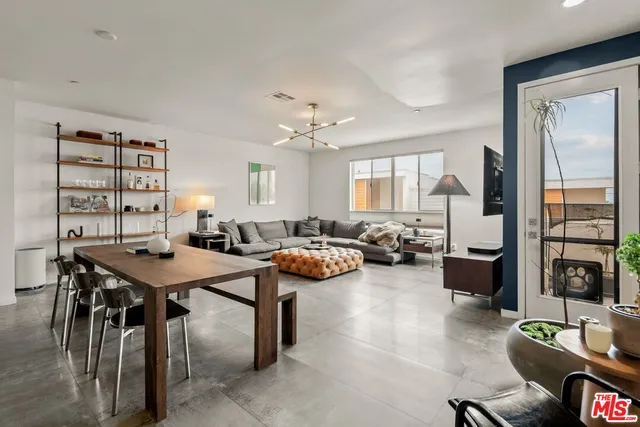 a view of a livingroom with furniture and window